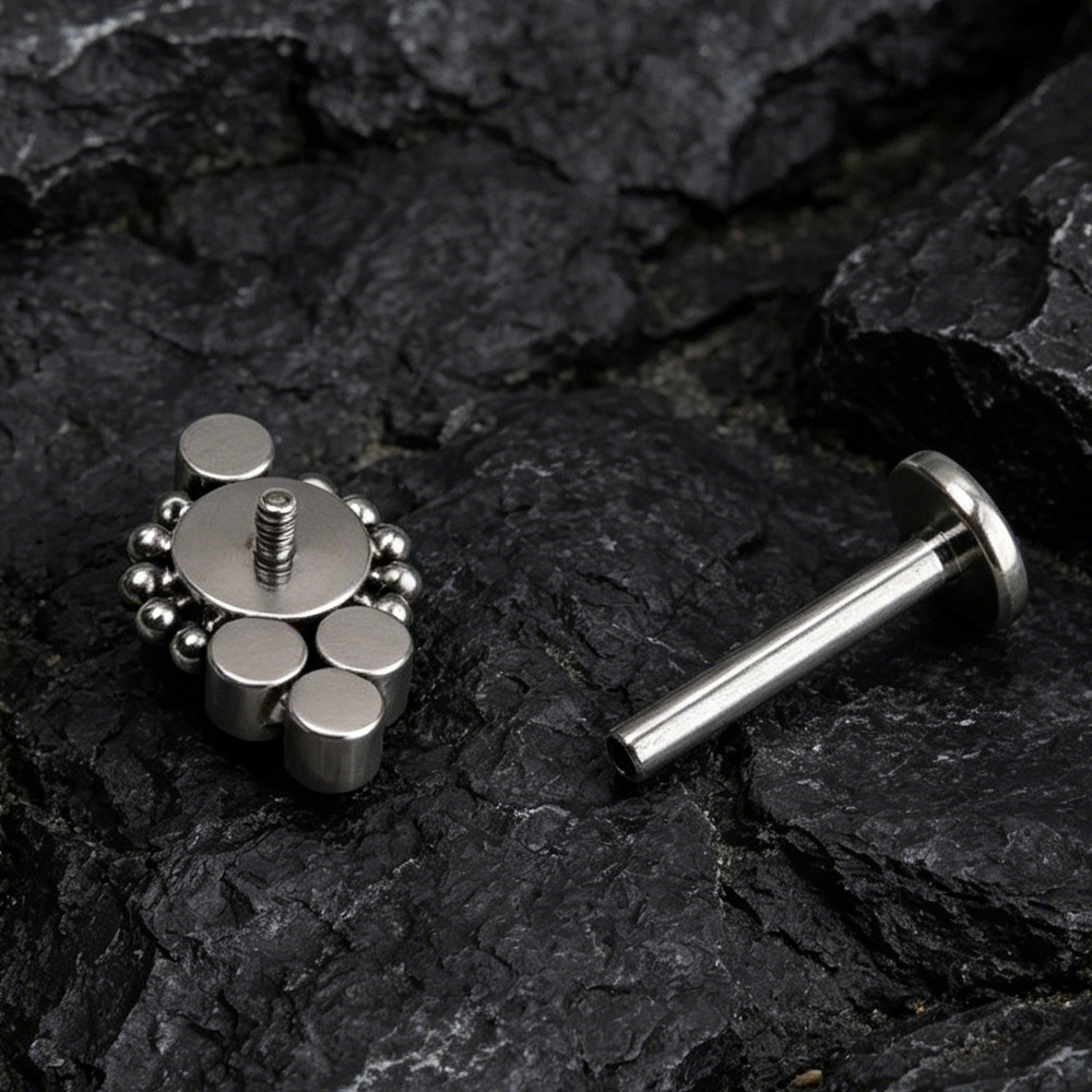 ASTM F136 Titanium Sunflower W - مراجعة Body Jewelry Implant Grade وسعره
