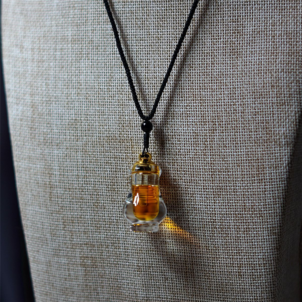 Agarwood Essential Oil Pendant - مراجعة Body Jewelry Co وسعره